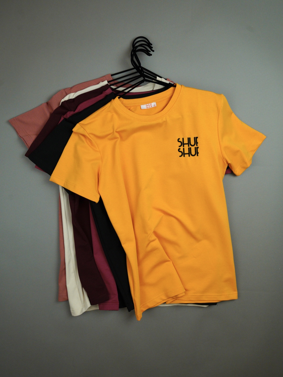 yellow t shirt (black shufshuf logo)